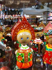 Fototapeta na wymiar Beautiful Russian wooden matryoshka dolls in the store