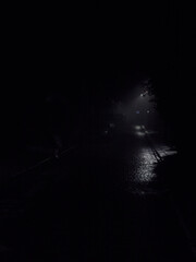 A familiar, mundane London street transformed into a eldritch, liminal space by a freak heavy bank of winter fog.