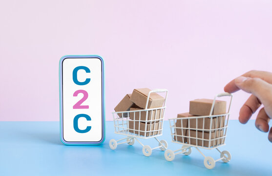 Business ecommerce or online shopping concepts with c2c and smartphone and product box order in trolley
