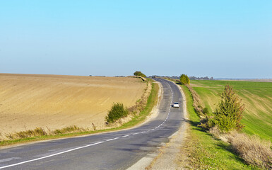 Fototapeta na wymiar photo of the road passing through the fields in Ukraine