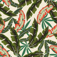 Fashionable seamless tropical pattern with bright plants and leaves on a beige background. Tropic leaves in bright colors. Seamless exotic pattern with tropical plants. Jungle leaf seamless.