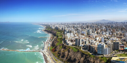 Aerial panorama of Lima, Peru along the coast also known as Circuito de Playas de la Costa Verde at...