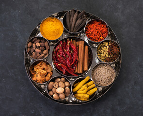 Indian spices and seasonings.  Masala box. - obrazy, fototapety, plakaty