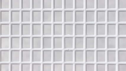 Rejilla de plástico blanco con cuadrícula de celdas cuadradas