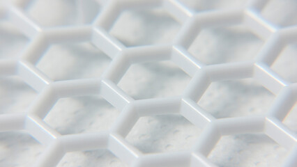 Detalle de cuadrícula de celdas hexagonales en rejilla de plástico blanco