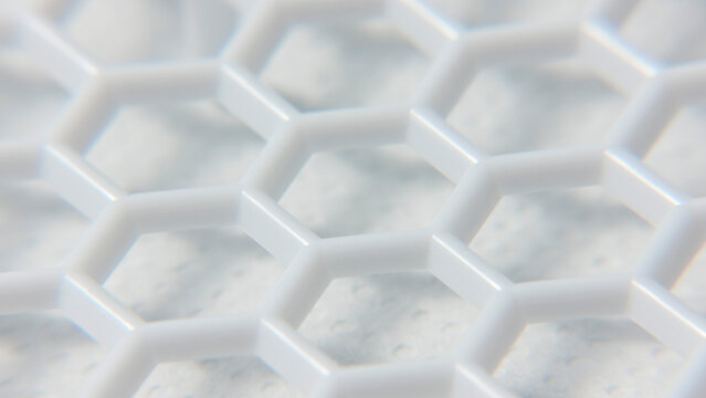 Detalle de cuadr&iacute;cula de celdas hexagonales en rejilla de pl&aacute;stico blanco