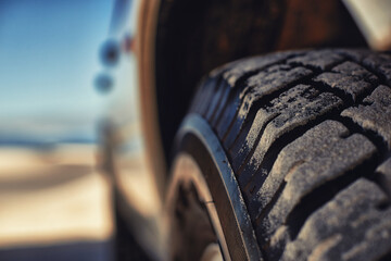 Ready for anything on the trail. Shot of a heavy duty 4x4 driving along some sand dunes.