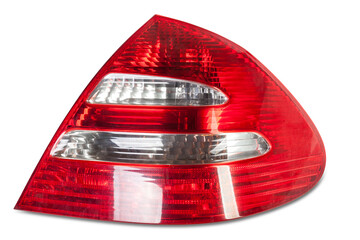 A taillight of a stop signal for a German auto - optical equipment of white and red color on a white isolated background. A spare part for repair and sale in a car service center