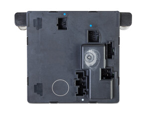 Plastic car engine control unit with metal elements on a white isolated background is the...
