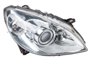 Stylish xenon headlight of a German car - optical equipment with a lamp inside on a white isolated background. Spare part for auto repair in a car workshop