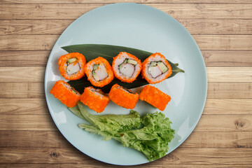 Japanese roll with tuna and white rice in tobiko caviar