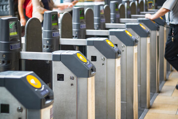 Selective focus, automatic ticket barriers at London Paddington station - obrazy, fototapety, plakaty