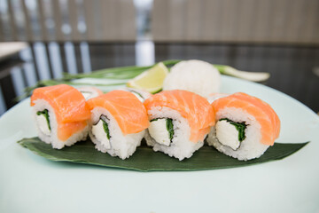 sushi roll philadelphia with salmon on a plate japanese cuisine