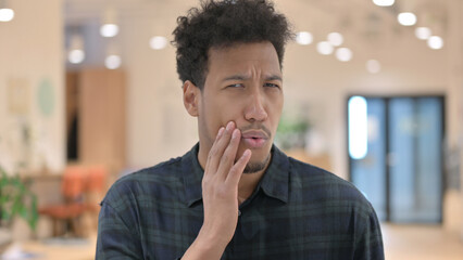 Attractive African American Man having Toothache, Cavity