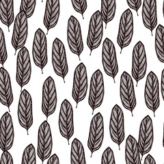 Alocasia leaves seamless pattern.Vintage tropical branch in engraving style.