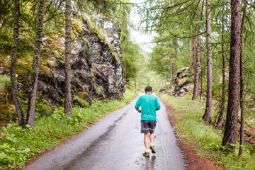 Fototapeta premium sick man jogging in the mountains
