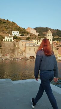 Young girl has fun in Vernazza, city of the Cinque Terre