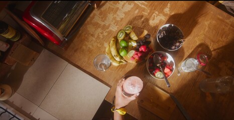 A person making a smoothie