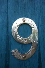 Written Wording in Distressed Typography Found Number Nine 9