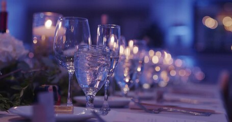 Wedding. Restaurant banquet table set up served dinner tableware and silverware. Close up view