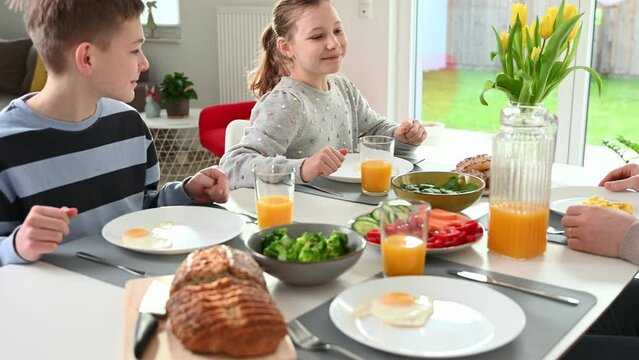 Children having health family breakfast