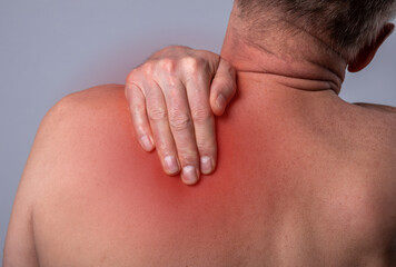 Trigger points pain. Ache in back, pressure in scapula close up. High quality photo