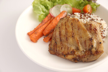 Grilled chicken with rice isolated in white background