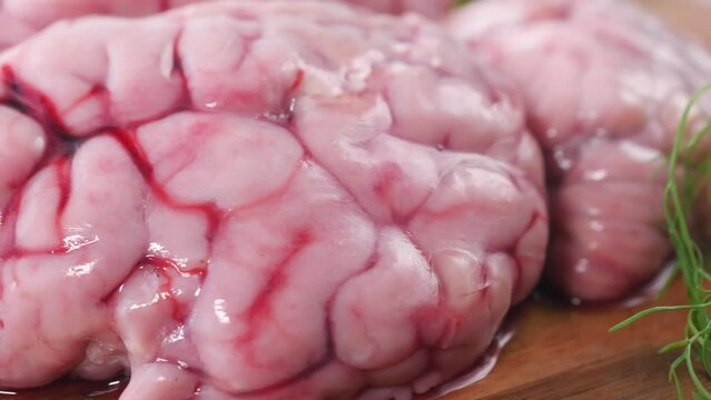 close up of mutton brain on a chopping board 