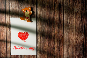 Red hearts on old wood background.Happy valentine's day card.Place for text.	
