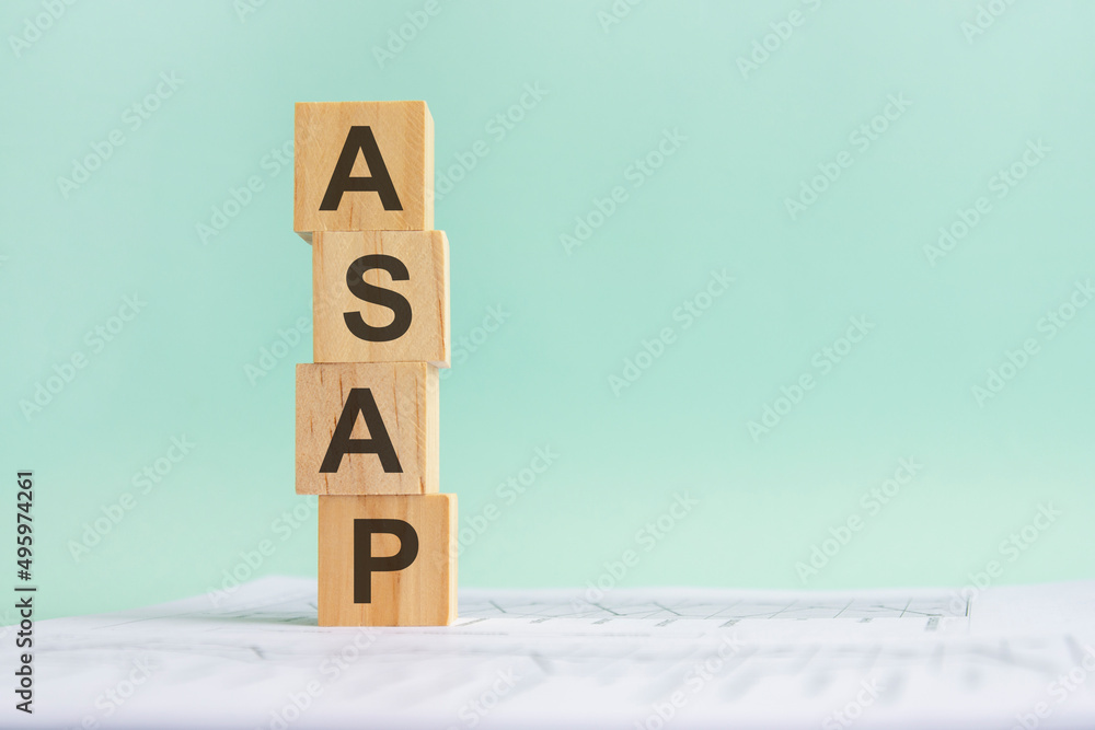 Poster text asap with wood building blocks, light gray background. document with numbers on background, bus