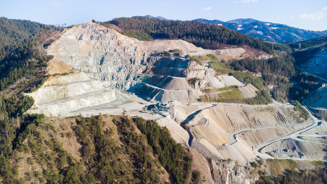 Aerial view of a huge opencast mining area at a mountain in Austria