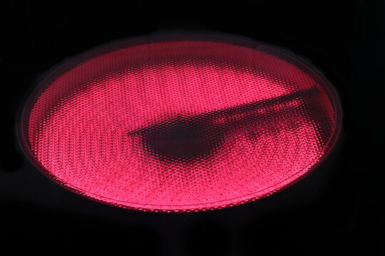 Electric hotplate on. Energy prices. Detail of a switched on stove. Cooker on.