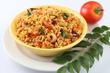 Tomato rice.spicy South Indian rice recipe Tomato pulao or Tomato Rice ,South Indian Thakkali Sadam ,Tomato Bath an Indian vegetarian dish. Healthy nutritious