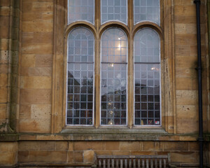 Traditional old leaded window in stone build English church window 