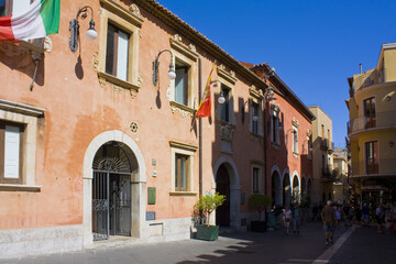 Fototapeta na wymiar Building of City Hall in Old Town of Taormina, Sicily, Italy 