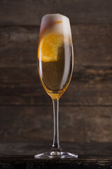 Alcoholic drink orange. Photo of a drink on a dark background