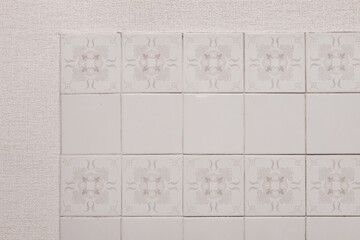 Old white abstract tile with vintage pattern decoration retro interior texture background