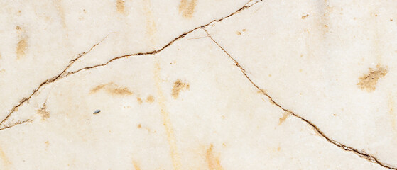 Cracked antique marble texture. Weather-cracked stone wall