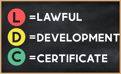 Lawful development certificate - LDC  acronym written on chalkboard, business acronyms.