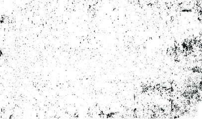 Small uneven spots and particles of debris. Abstract vector texture. Distressed uneven background. Grunge texture overlay with fine grains isolated on white background. Vector illustration. EPS10.