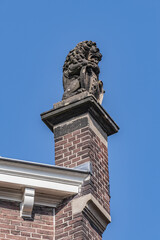Architectural fragments of old Amsterdam building: XIX century Neo-Renaissance-style building,...