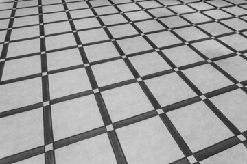 Dark grey floor tile with abstract gray geometric pattern surface texture background