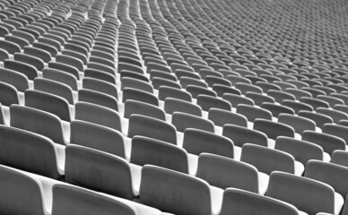 Series of many grey bleachers in the arena