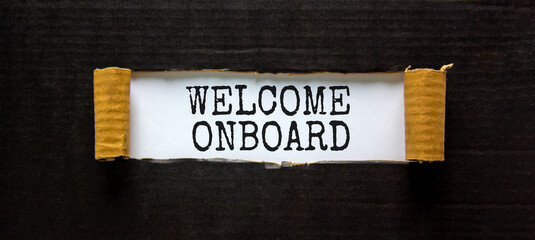 Welcome onboard and support symbol. Concept words Welcome onboard on white paper. Beautiful black background. Copy space. Business and Welcome onboard concept.