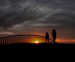 sunset, silhouette, sky, sun, beach, sunrise, people, sea, family, couple, ocean, walking, nature, woman, love, clouds, person, landscape, mountain, water, cloud, orange, boy,bridge