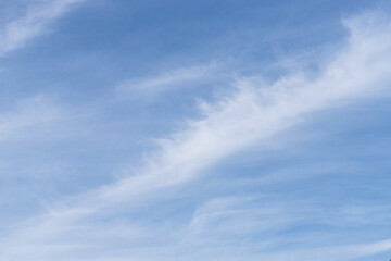 Blue Sky with White Cirrus Clouds in Diagonal Line