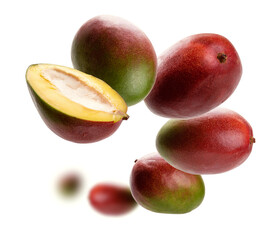 Mango whole and cut levitates on a white background