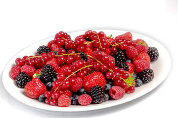 Fruit plate: strawberries, blueberries, raspberries, red currants