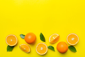 fresh Fruit orange slices on colored background. Top view. Copy Space. creative summer concept. Half of citrus in minimal flat lay with copy space