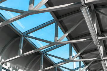 Fototapeta na wymiar Industrial metal framework background of urban road bridge view from below
